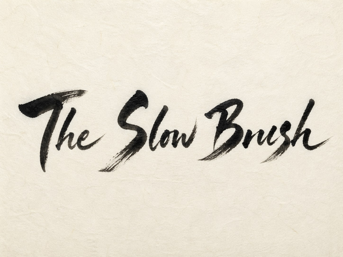 The Slow Brush — a hand-brushed sumi ink title on washi paper
